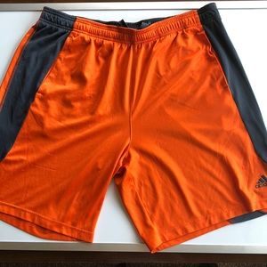 Orange “Adidas” Shorts.